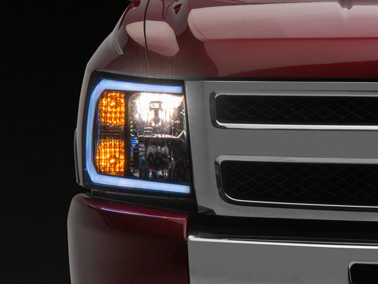 Raxiom 07-13 Chevrolet Silverado 1500 Axial Headlights w/ SEQL LED Bar- Blk Housing (Clear Lens)