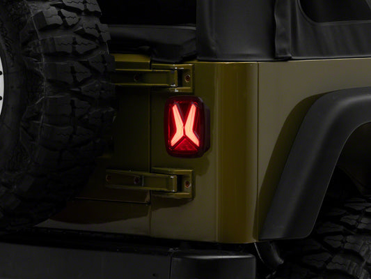 Raxiom 76-06 Jeep CJ7 Wrangler YJ & TJ Gladiator LED Tail Lights- Blk Housing (Smoked Lens)