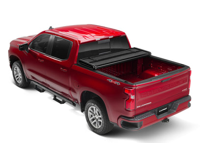 Lund 07-13 Toyota Tundra Fleetside (6.5ft. Bed) Hard Fold Tonneau Cover - Black