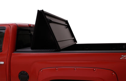 Lund 05-10 Dodge Dakota Fleetside (6.5ft. Bed) Hard Fold Tonneau Cover - Black