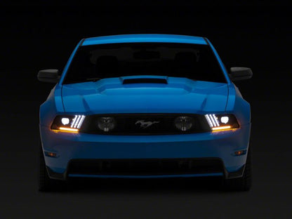 Raxiom 10-12 Ford Mustang LED Projector Headlights SEQL Turn Signals- Blk Housing (Clear Lens)