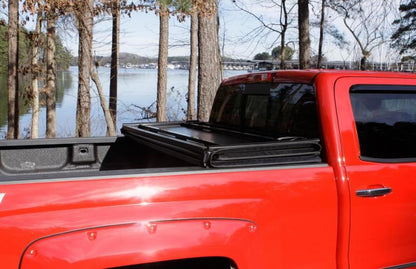 Lund 88-99 Chevy C1500 Fleetside (6.6ft. Bed) Hard Fold Tonneau Cover - Black