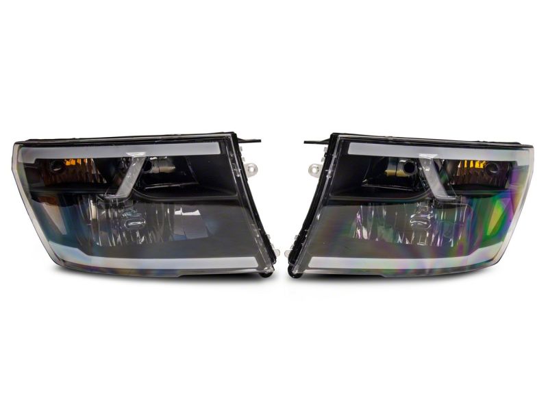 Raxiom 09-18 Dodge RAM 1500/2500/3500 Axial Headlights w/ SEQL LED Bar- Blk Housing (Clear Lens)