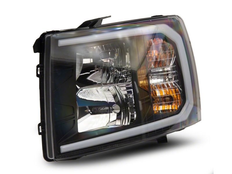 Raxiom 07-13 Chevrolet Silverado 1500 Axial Headlights w/ SEQL LED Bar- Blk Housing (Clear Lens)