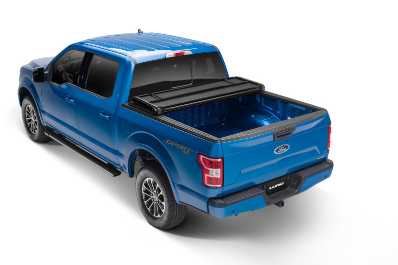 Lund 15-18 Ford F-150 Styleside (5.5ft. Bed) Hard Fold Tonneau Cover - Black