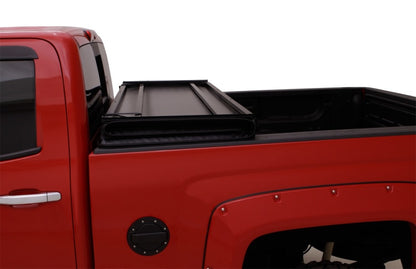 Lund 15-17 Chevy Silverado 3500 Fleetside (6.6ft. Bed) Hard Fold Tonneau Cover - Black