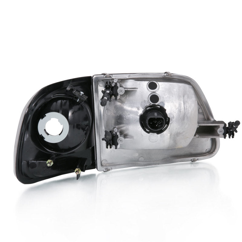 ANZO 1997-2003 Ford F150 Crystal Headlight Black w/ Parking Light