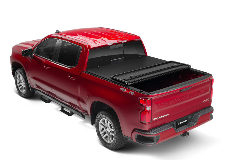 Lund 07-13 Chevy Silverado 1500 Fleetside (6.6ft. Bed) Hard Fold Tonneau Cover - Black