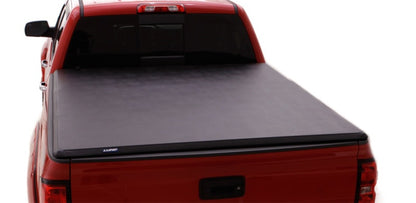 Lund 05-15 Toyota Tacoma Fleetside (5ft. Bed) Hard Fold Tonneau Cover - Black